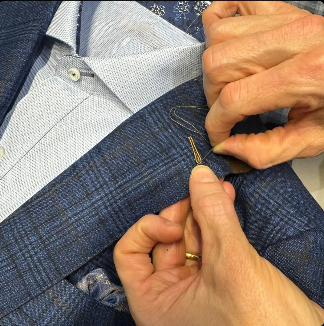 Hand-stitching detail on a bespoke jacket lapel